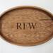 Oval tray with personalization. Made from Mahogany